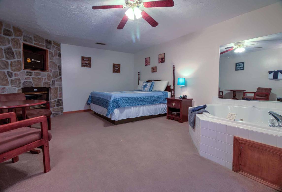 Motel Room with TV and King Bed
